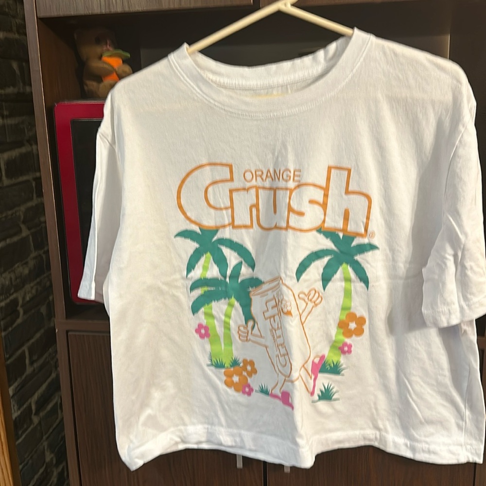 Woman’s plus size Orange Crush white crop top
